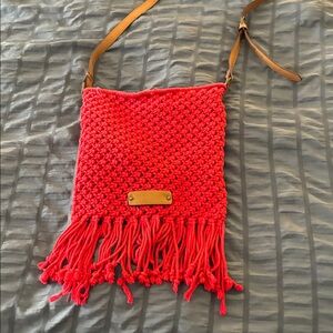 Adorable Lucky Brand red crochet purse with fringe.
